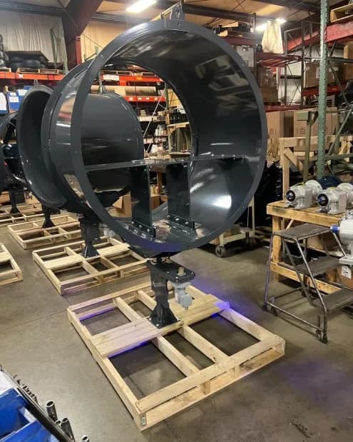 Custom industrial pallets with mounted equipment in a manufacturing facility